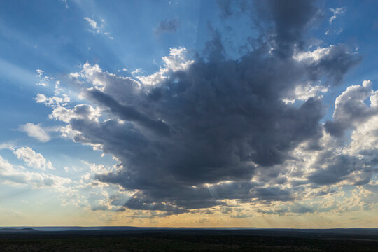 Crepuscular Rays piercing clouds over the Great Plains
