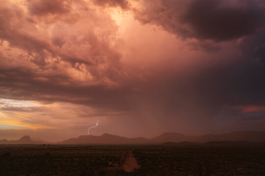 Storm laden with dust and lightning over mountains near douglas