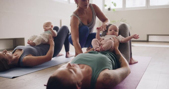 Yoga, baby and instructor with women in class for balance, maternal connection and mindfulness. Wellness, mommy and me session with people in studio for exercise, child bonding and pilates together