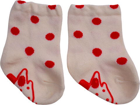 White children's socks featuring a striking red polka-dot pattern and playful non-slip soles set against a transparent background.