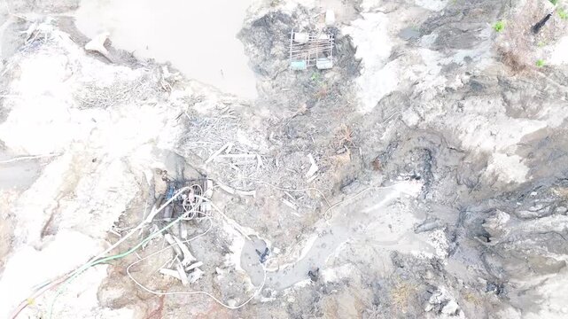 Aerial View of Workers Using Water Jets in Tin Mining