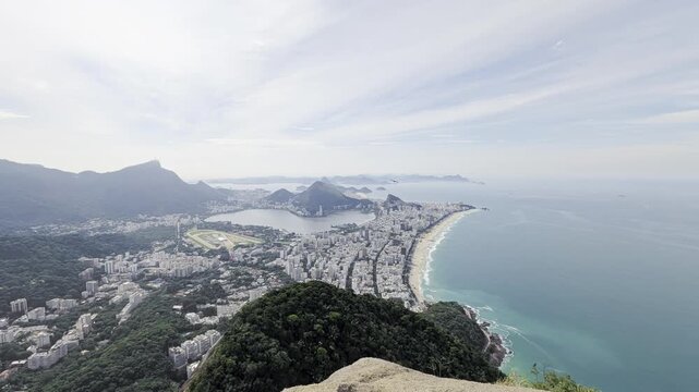 View of the coastline of Rio de Janeiro featuring the Lagoa Rodrigo de Freitas, Ipanema beach, and surrounding urban landscape in Rio de Janeiro, Rio de Janeiro, Brazil.