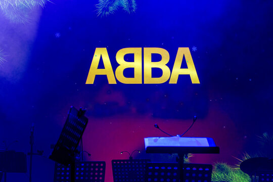 Madrid, Spain - January 02, 2026: Logo of Swedish pop group ABBA on stage screen of concert dedicated to the anniversary