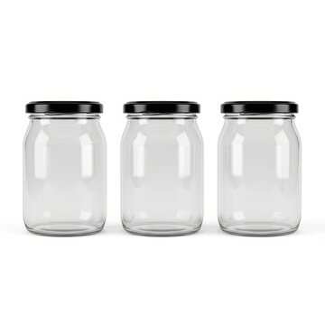 Three empty glass jars with black lids