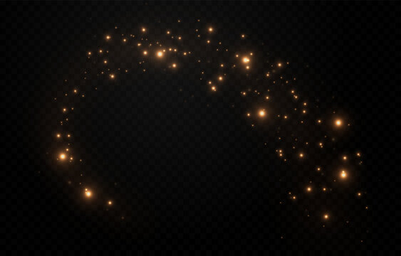 Golden glowing magic dust on a transparent background. Flying light particles PNG. Glowing dust PNG.