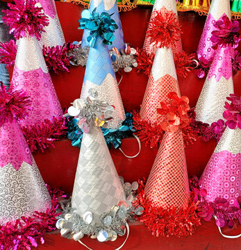 Colorful Glitter Party Hats Display for Birthday Celebration