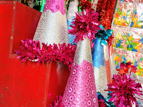 Colorful Glitter Party Hats Display for Birthday Celebration