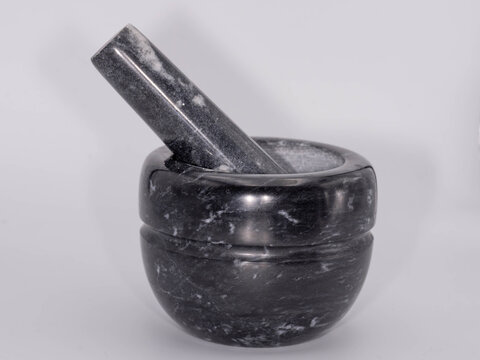 Food Preparation - Stone mortar and pestle with sesame seeds