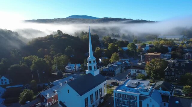 Aerial drone view of a quaint Northeast American town and church main street