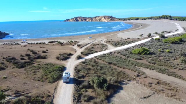 Campervan on Dalan Beach Albania Aerial Drone Shot 4K