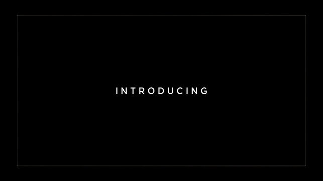 Minimalist cinematic title card with introducing text on black background. Elegant intro screen with thin border line for presentation or video opening for product launches, teaser trailers.
