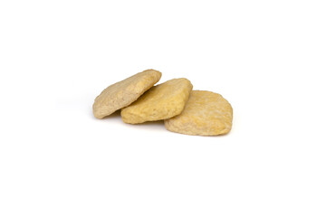 Fototapeta premium Baked tofu pockets arranged on isolated white background
