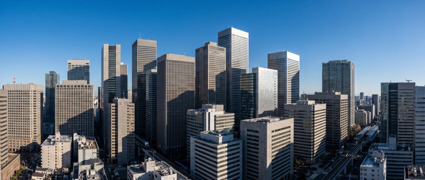 Clear daytime skyline showcases a dense cluster of downtown high rise office towers