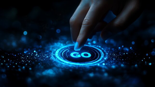 Human finger pressing a glowing 'go' button with digital particle effects on a dark background