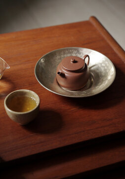 Closeup of traditional Chinese tea ware and tea on the dining table