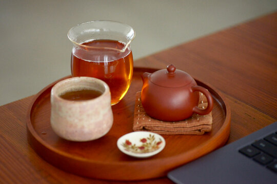 Closeup of traditional Chinese tea ware and tea on the dining table
