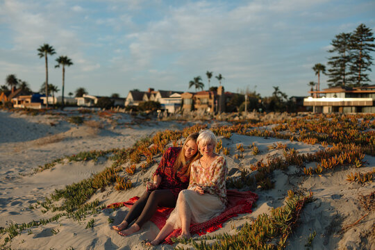 Mother and Adult Daughter Sharing Affection at California Beach