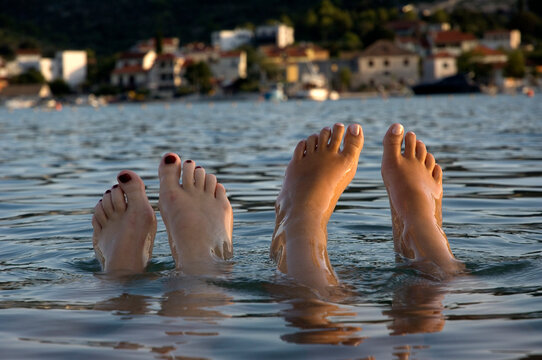 Four feet in the sea