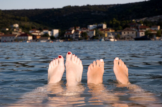 Four feet in the sea