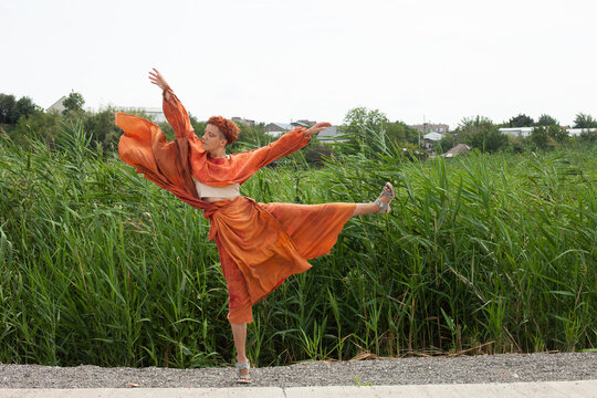 Walking in the terracotta dress