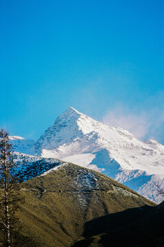 Towering Snow-Capped Mountain in Beautiful Setting on New Zealand