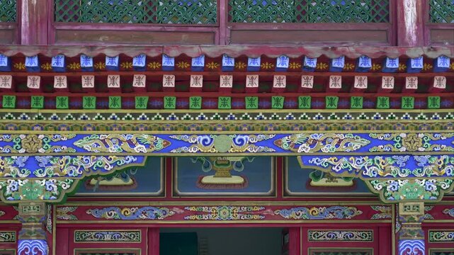 Traditional Mongolian Buddhist architecture shows colorful decorations and cultural detail.