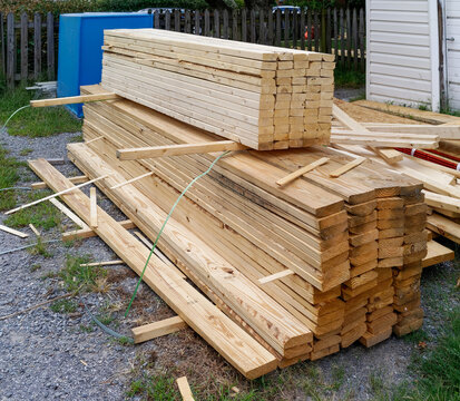  Stacked Wooden Lumber for Construction Project