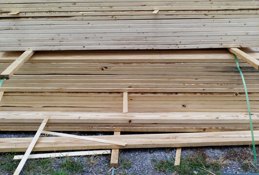  Stacked Wooden Lumber for Construction Project