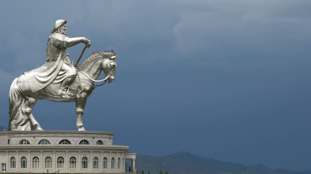 The giant equestrian genghis khan statue rises in ulanbaatar mongolia against a clear sky.