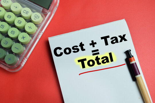 Concept of cost plus tax equals total formula write on book isolated on table. For finance accounting and calculation