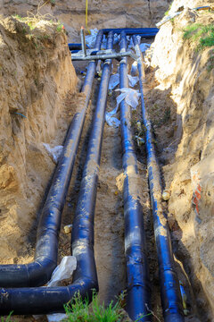 District long heating pipes in trench, construction of utility infrastructure, and general construction works