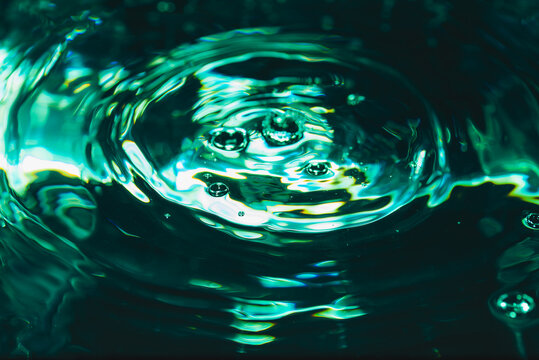 372.Concentric Ripples and Bubbles on Blue-Green Water