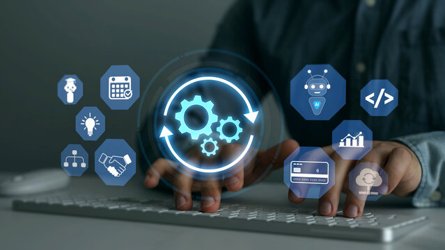 Businessman developing an AI automation system for workflow optimization, process management, operational efficiency, and digital business transformation.

