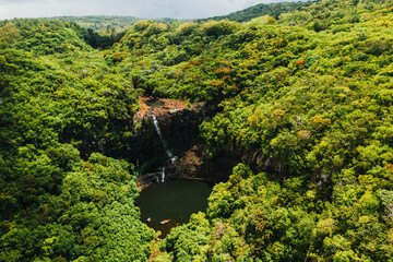 Aerial view from above of the Tamarin waterfall seven cascades in the tropical jungles of the island of Mauritius © Alex