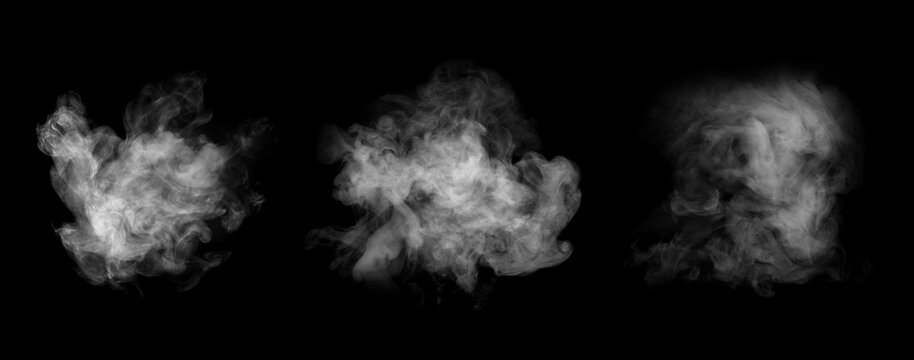 Smoke set isolated on black background. White cloudiness, mist or smog background.