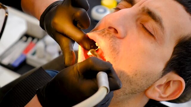 A man at a dentist appointment. Selective focus.