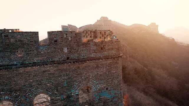 Flying over the Great Wall of China at sunset