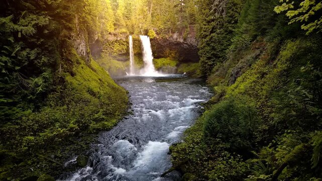 Aerial shot of the amazing Koosah Falls and lush moss covered forest on the McKenzie River in Oregon.