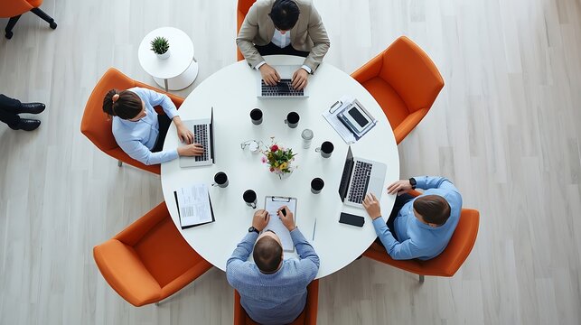 Modern Business Meeting: Overhead View of Diverse Team Collaboration