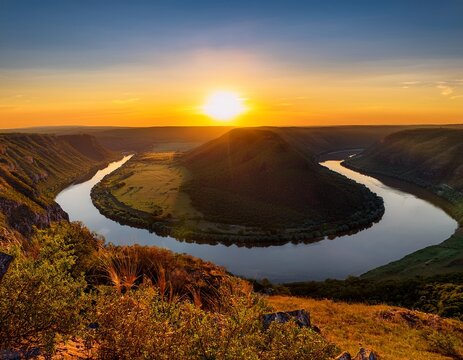 golden hour quest capturing a river s winding path from the edge of the world