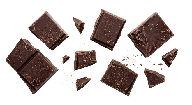 Top view of broken dark chocolate pieces and crumbs isolated on a clean white background