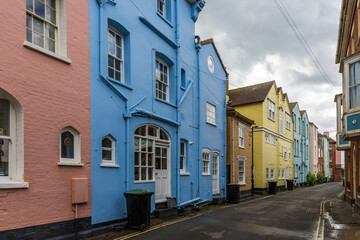 Fototapeta premium A row of colourful terraced houses on King Street in the seaside town of Aldeburgh, Suffolk, England