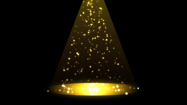 Golden stage spotlight with glowing dust particles