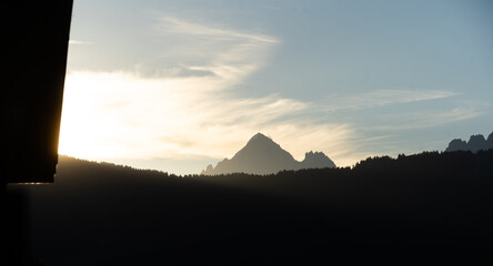 Obraz premium Summer view of the Mont Blanc massif above forested slopes 