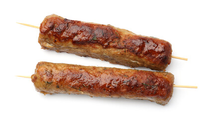 Fototapeta premium Skewers with tasty kebabs isolated on white, top view