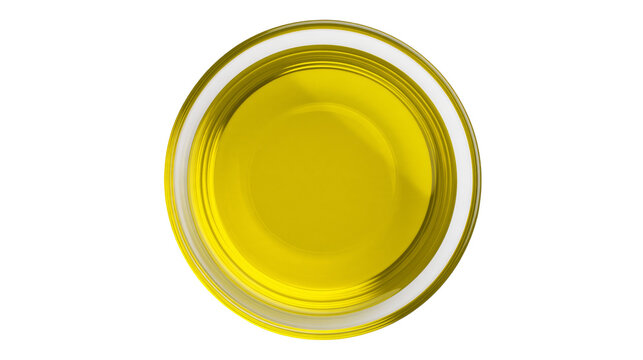Isolated olive oil in a clear glass bowl, golden liquid, cooking ingredient from above