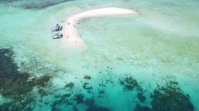 Aerial view of Taka Makassar sandbar in turquoise ocean water Komodo National Park