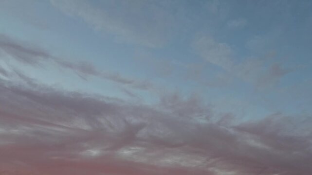 Curious ash cirrostratus clouds in the sky