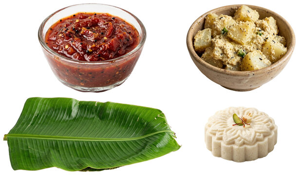 A collection of traditional Bengali thali components including a banana leaf plate, sandesh sweet, tomato chutney and aloo posto.