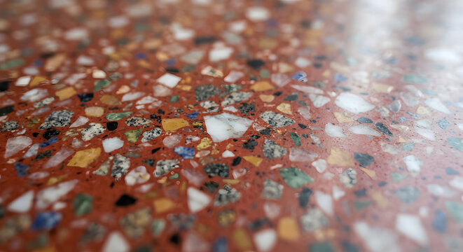 Macro close up view of a red terrazzo tile surface texture